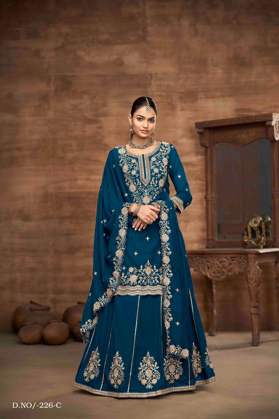 Royal Elegance Embroidered Vichitra Silk Lehenga Set